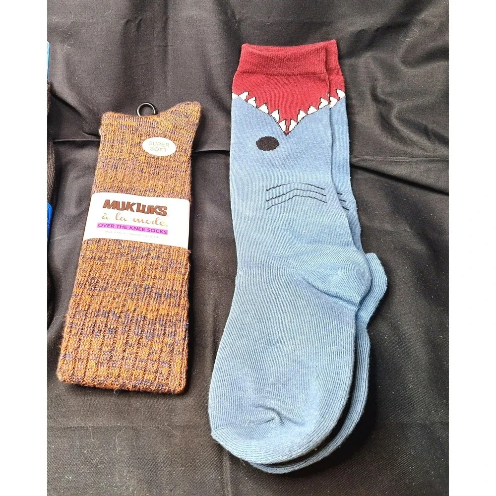 Women's one pair‎ of Mukluks Over the knee socks and on pair of Shark bite socks